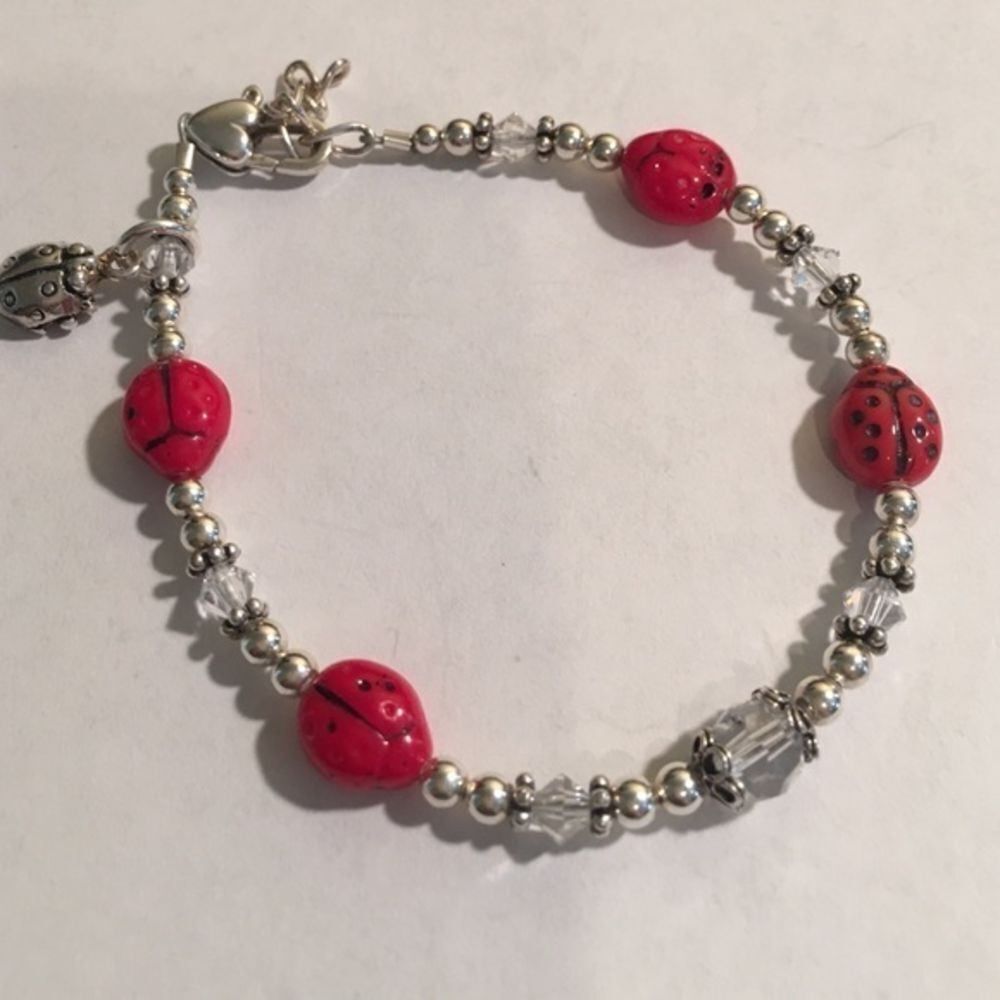 Sterling ladybug bracelet with‎ heart clasp